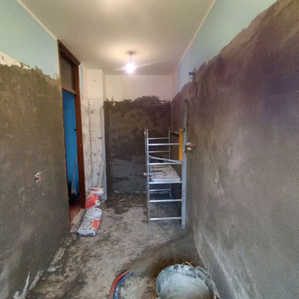 Intonaco del disimpegno in corso — Bagno a San Mauro Torinese